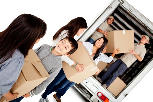 Moving boxes and furniture prepared for a Haringey home relocation