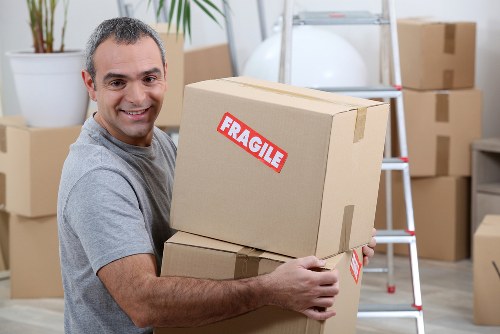 Moving home in Haringey with boxes and furniture ready for transport