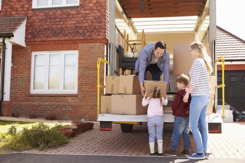 Van loading furniture in a Haringey residential street