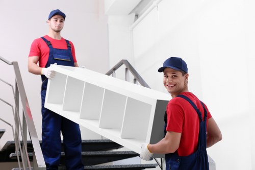 Careful wrapping of fragile household items before a move