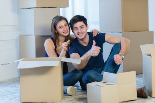 Professional movers handling a flat removal in North London