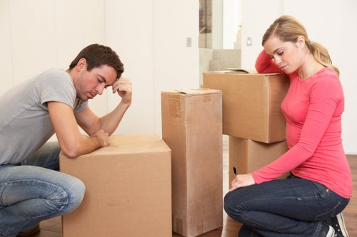 Unpacking boxes and organising belongings in a Haringey property