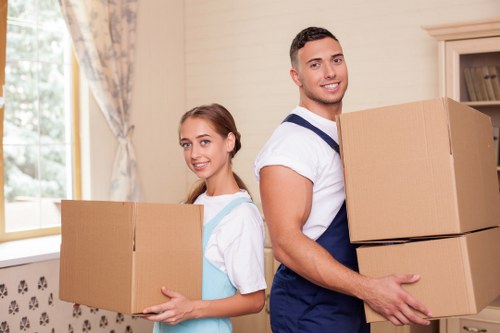 Packed boxes and furniture ready for transport during a local move
